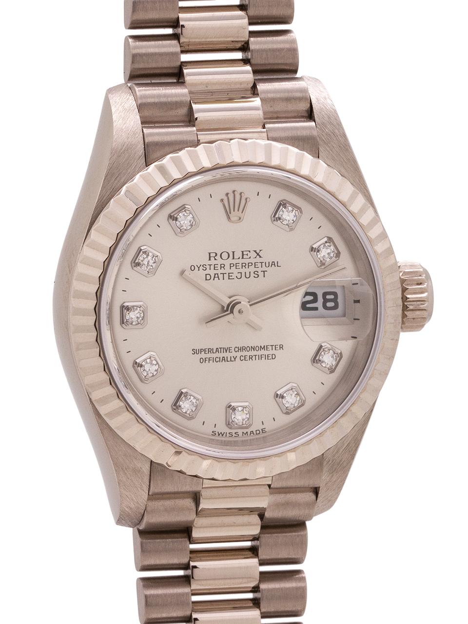 
A beautiful Lady President Rolex in 18K white gold, ref 79174 serial #A circa 1999. Featuring a mint condition 26mm diameter case with fluted bezel, and sapphire crystal. The condition of this piece can’t possibly be overstated. It’s hard to