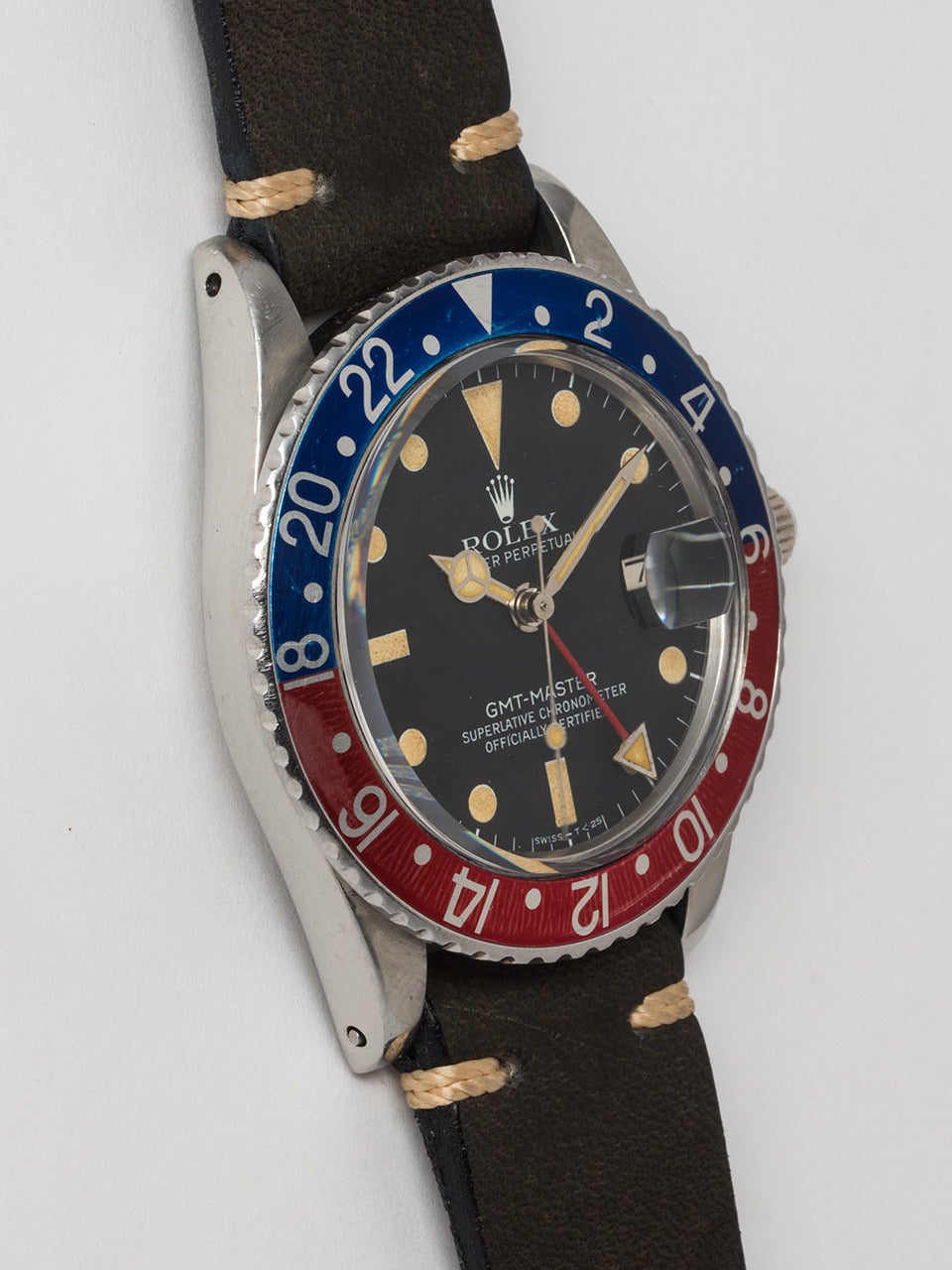 Rolex Stainless Steel GMT-Master Wristwatch ref 16750 serial# 6.6 million circa 1981. 40mm diameter case with 24 hour lightly faded red and blue so called Pepsi bezel. Gorgeous original matte black dial with unusually richly patina'd luminous