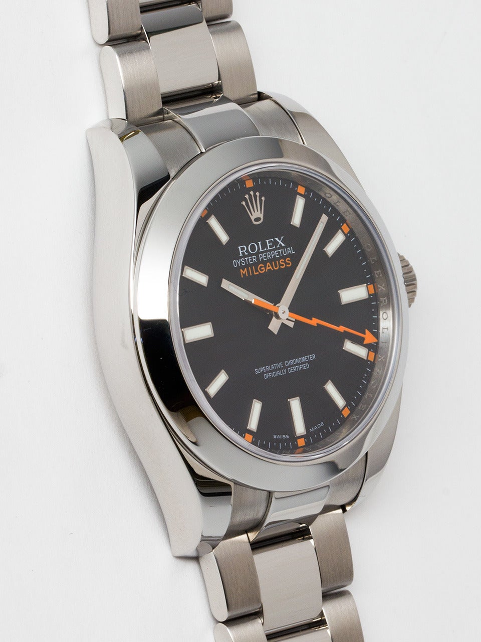 Rolex Stainless Steel Milgauss Wristwatch ref # 116400 serial #V1 circa 2008. 40mm diameter Oyster case with wide smooth bezel and sapphire crystal. Gloss black dial with super luminova bright glow indexes and hands, orange lighting bolt sweep