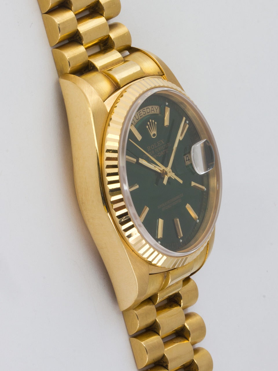 Rolex 18K Yellow Gold Day Date President Wristwatch ref 18038 serial # 5.2 million circa 1978. Super sharp condition example 36mm diameter Oyster case with heavy beefy lugs and fluted bezel. Very pleasing custom colored 
