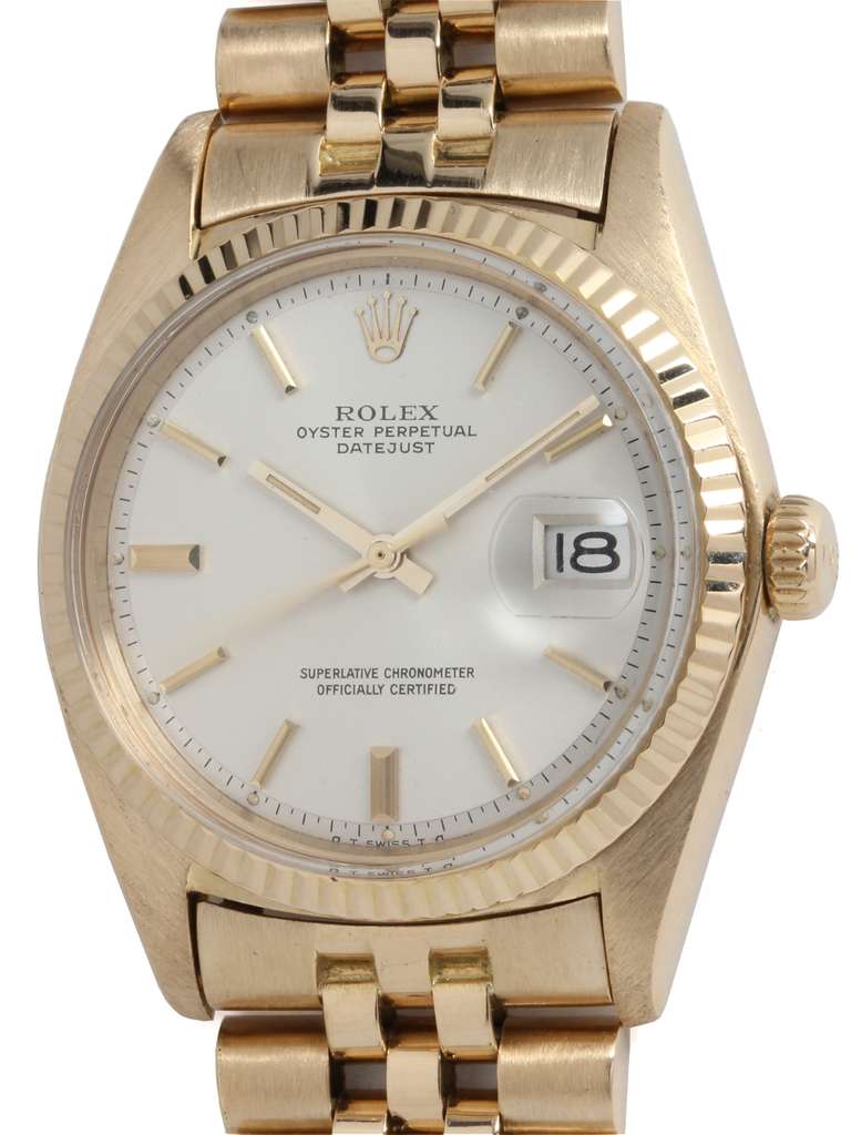 Rolex 18k yellow gold Datejust wristawatch, Ref. 1601, serial number 3.9 million, circa 1974. 36mm case with fluted bezel, acrylic crystal, and beautiful condition original matte silvered pie pan dial with applied gold indexes and gold baton hands.