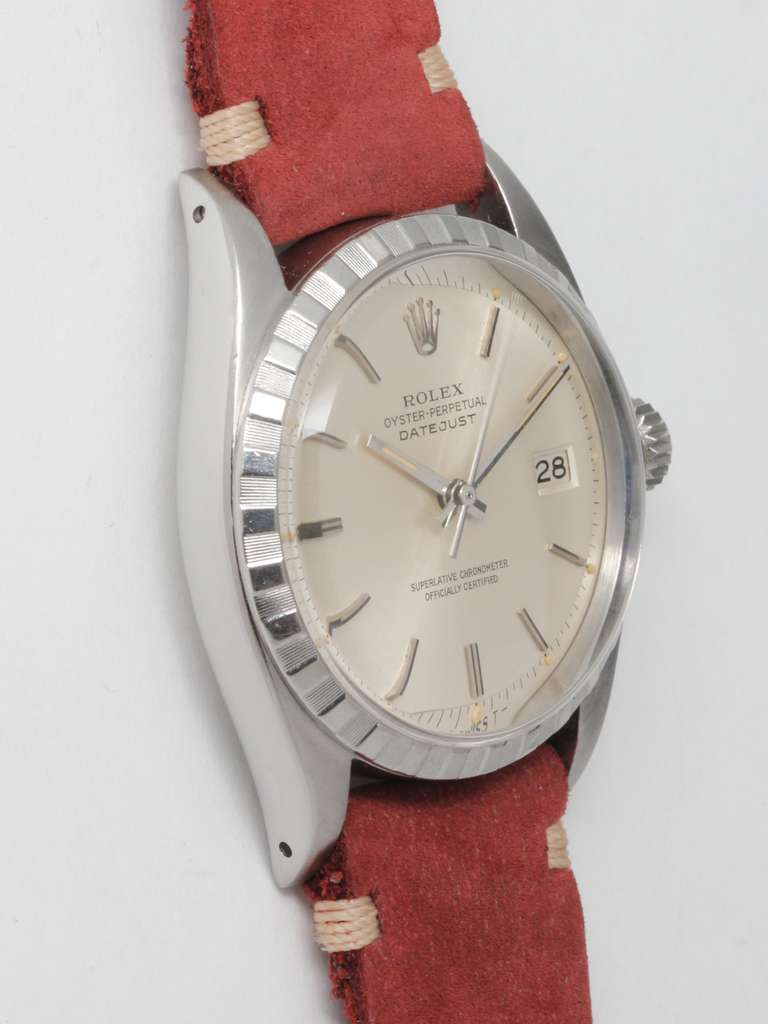 Rolex stainless steel Datejust wristwatch, Ref. 1601, serial number 415,XXX, circa 1958. 36mm full-size man's model with early-style checkerboard bezel, acrylic crystal, and original silvered matte dial with applied indexes and baton hands.