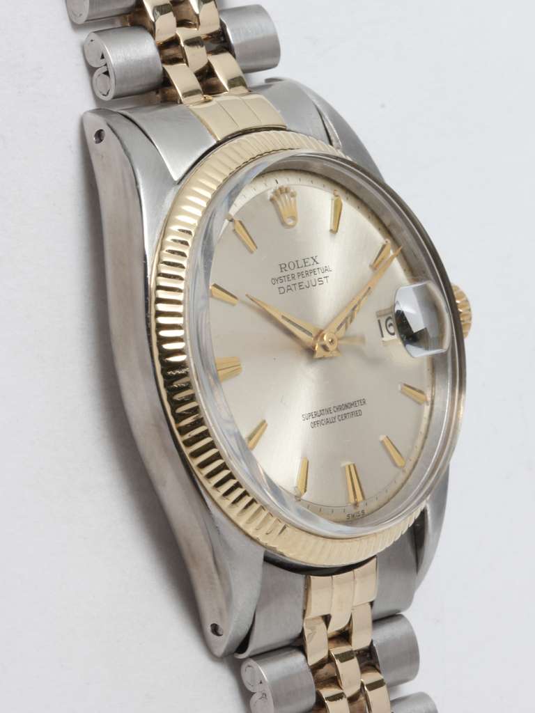 Rolex stainless steel and 14k yellow gold Datejust wristwatch, Ref. 1601, serial number 5.3. million, circa 1960. 36mm case with original silvered matte dial with tapered applied tapered indexes and dauphine hands, self-winding calibre 1570 movement
