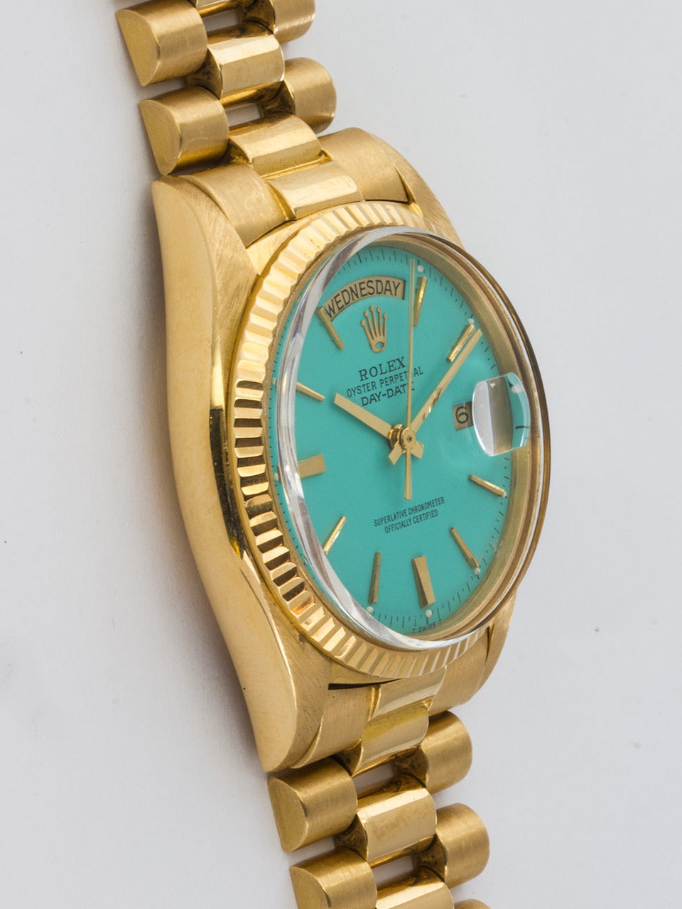 Rolex 18K Yellow Gold Day-Date President Wristwatch ref 1803 serial# 2.7 million circa 1971. Full size man's model, 36mm diameter Oyster case with fluted bezel and acrylic crystal. Featuring one of our most popular custom colored dial, Tiffany & Co