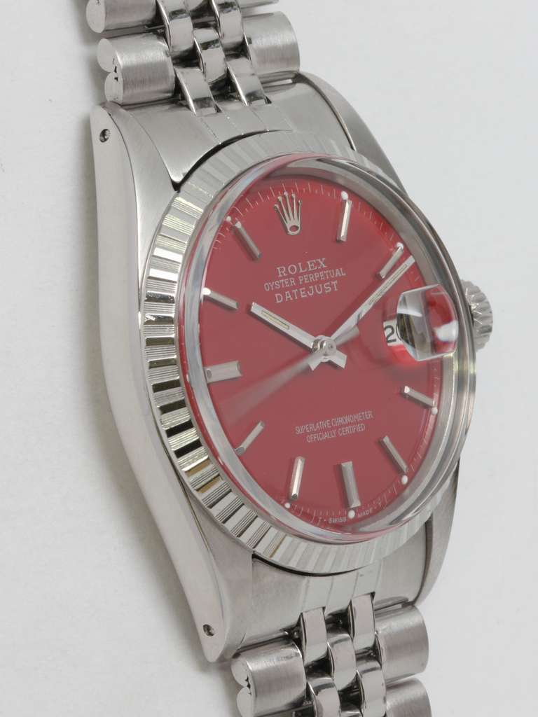 Rolex stainless steel Datejust wristwatch, Ref. 1601, serial number 3.6 million, circa 1973. 36mm full-size man's model with engine turned bezel and acrylic crystal. With beautiful custom-colored red pie-pan dial with applied indexes and baton