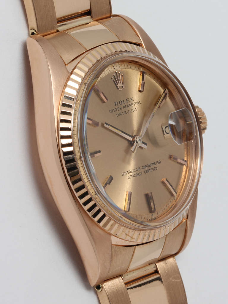 Rolex 18k rose gold Datejust wristwatch, Ref. 1601, serial number 3.3 million, circa 1974. 36mm full-size man's model with fluted bezel and acrylic crystal. With very pleasing original salmon pie-pan dial with applied rose indexes and Rolex logo and