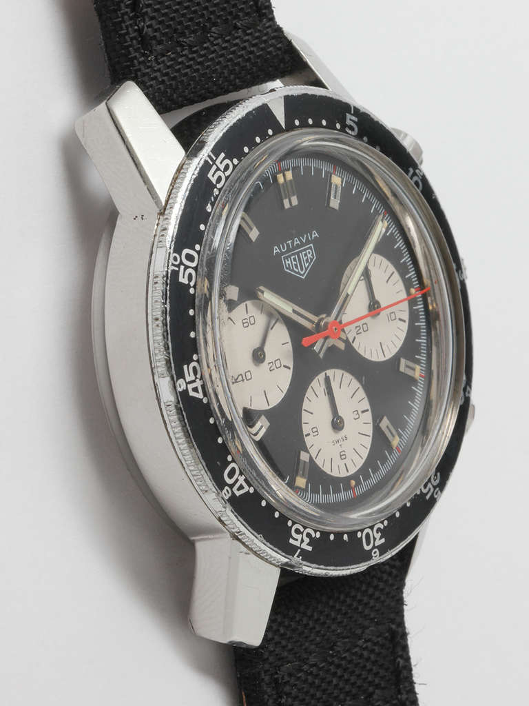 Heuer stainless steel Autavia chronograph wristwatch, Ref. 2446C, circa 1960s. Large 40.5mm case with compression case back. Featuring rotating elapsed-time bezel, very pleasing original black dial with contrasting white registers and applied baton