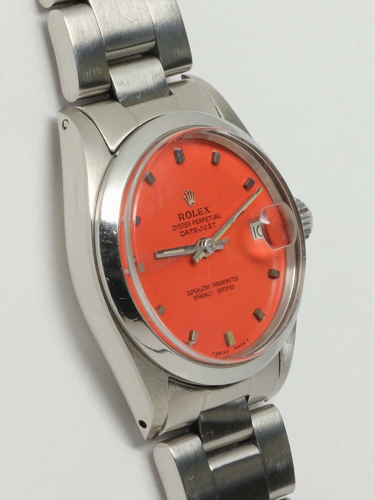 Rolex stainless steel midsize Datejust wristwatch, Ref. 6824, serial number 5.2 million, circa 1978. 31mm case with smooth bezel and acrylic crystal. With custom coral-color dial and applied square indexes. With Rolex stainless steel heavy Oyster