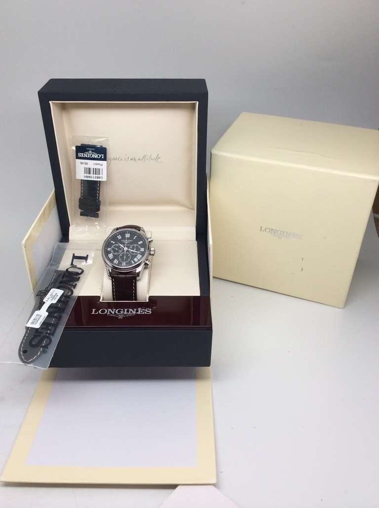 Longines stainless steel Master Collection automatic chronograph wristwatch, Ref. l2.693.4, serial number 33 million, circa 2005. Large 44mm case, with sapphire crystal and display back. Featuring a black dial with white Roman numerals and date.