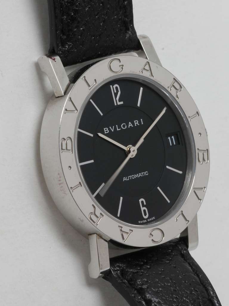 Bulgari stainless steel automatic wristwatch, circa 2000. 34mm case in excellent condition with wide bezel engraved BULGARI BULGARI. Matte black dial with Arabic 12 and 6 and baon indexes and hands. Powered by a self-winding movement with sweep