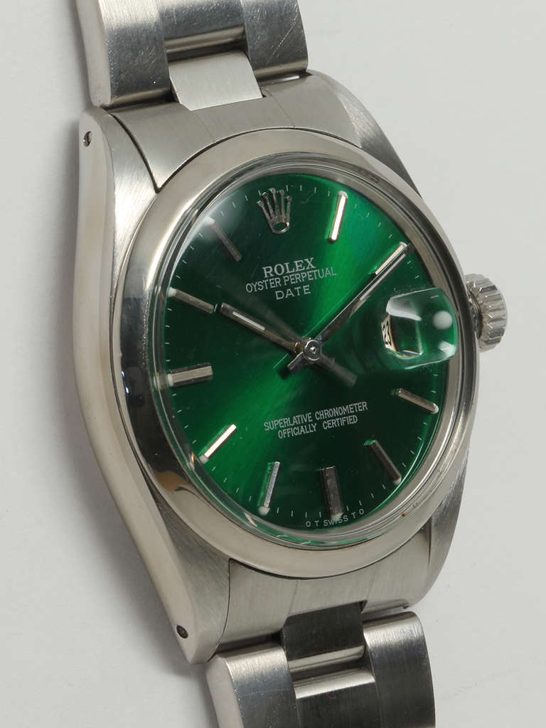 Rolex stainless steel Oyster Perpetual Date wristwatch, Ref. 15000, serial number 9.0 million, circa 1986. 34 mm case with smooth bezel and acrylic crystal. With custom-colored emerald green dial with applied indexes and baton hands. Powered by a