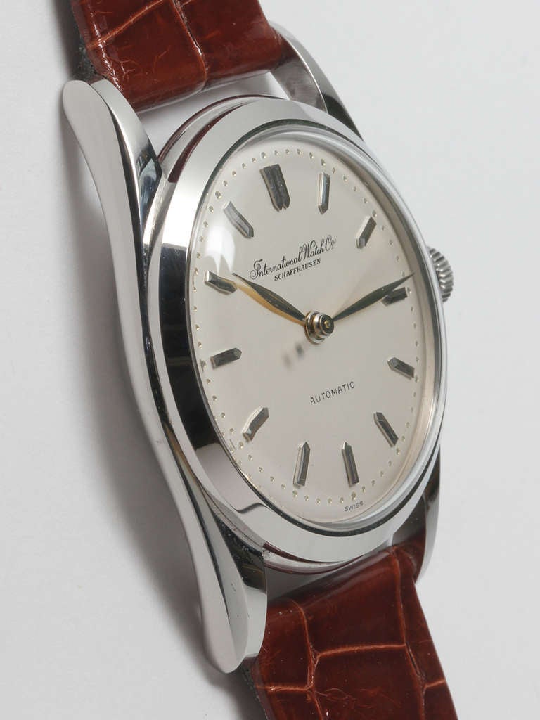 IWC stainless steel automatic wristwatch, circa 1950s. 34 x 44mm case with smooth bezel. Beautiful matte silvered dial, leaf hands. Powered by a self-winding movement with sweep seconds.

Offered on your choice of fine or exotic leather