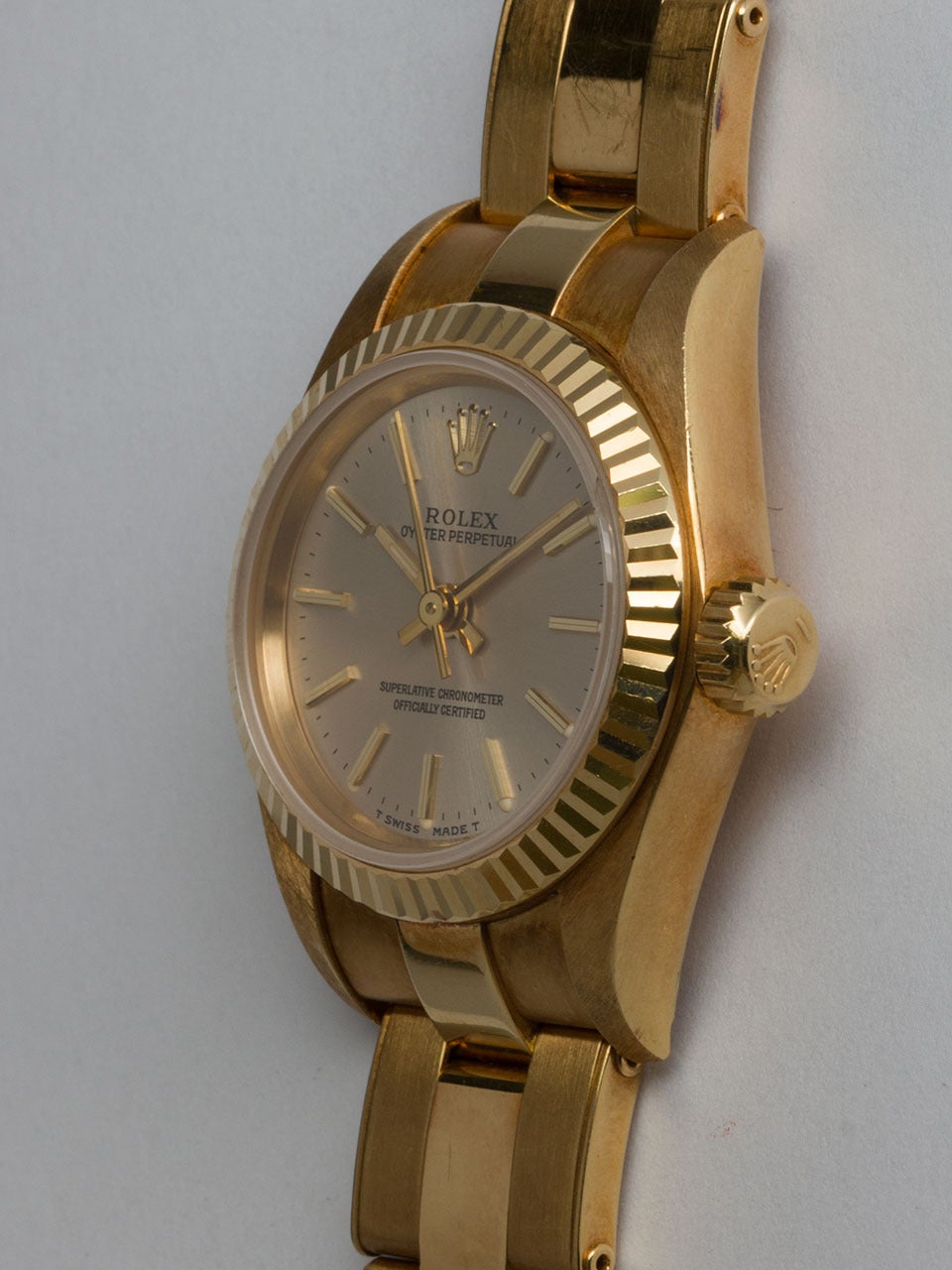 Rolex Lady's Yellow Gold Oyster Perpetual Wristwatch Ref 67198 circa 1996 In Excellent Condition In West Hollywood, CA
