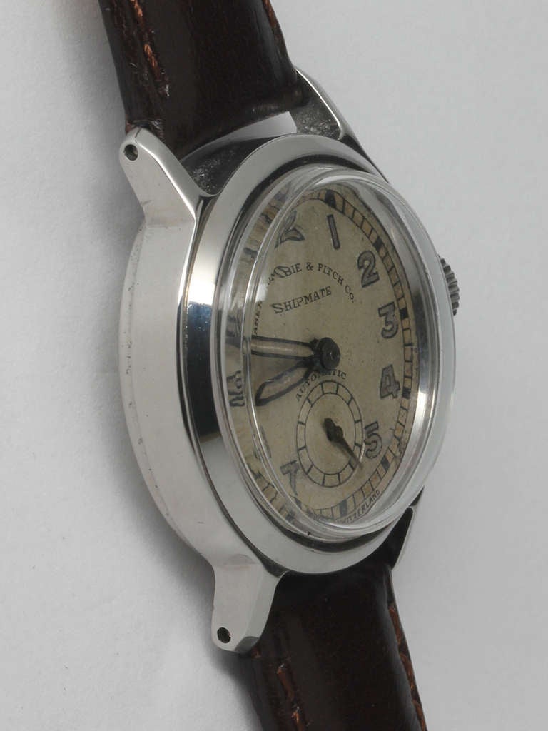 Abercrombie and Fitch stainless steel Shipmate automatic wristwatch, circa 1940s. Medium-size 29.5 x 34.5mm case with smooth bezel and acrylic crystal. Patinaed original dial with Arabic numerals and subsidiary seconds. Powered by an A. Schild 1049