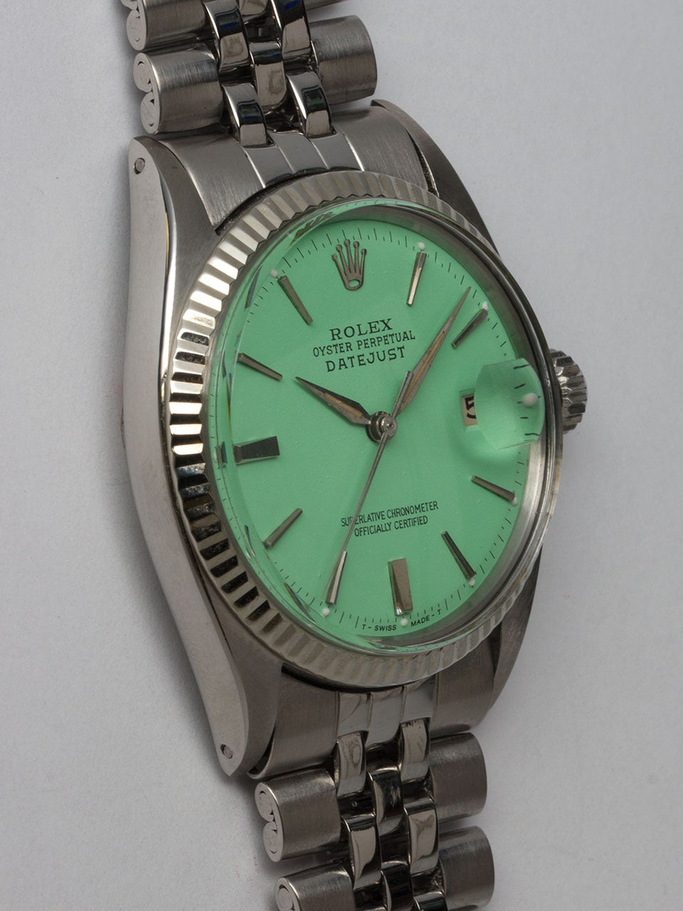Rolex Stainless Steel Datejust Wristwatch ref 1601 serial #952,xxx circa 1963. 36mm diameter case with 14K white gold bezel and acrylic crystal.  With custom colored Mint Green dial with silver sticks indexes and sword hands.Powered by self winding