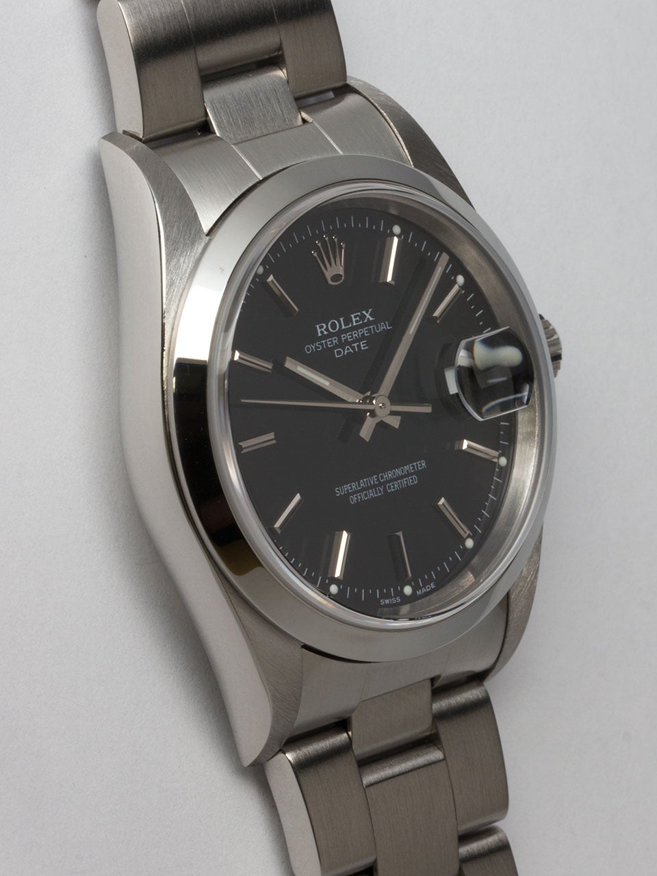 Rolex Stainless Steel Oyster Perpetual Date Wristwatch ref 15200 serial# K3 circa 2001. 34mm diameter case with smooth bezel and sapphire crystal. Original glossy black dial with applied silver indexes and silver baton hands. Powered by self winding