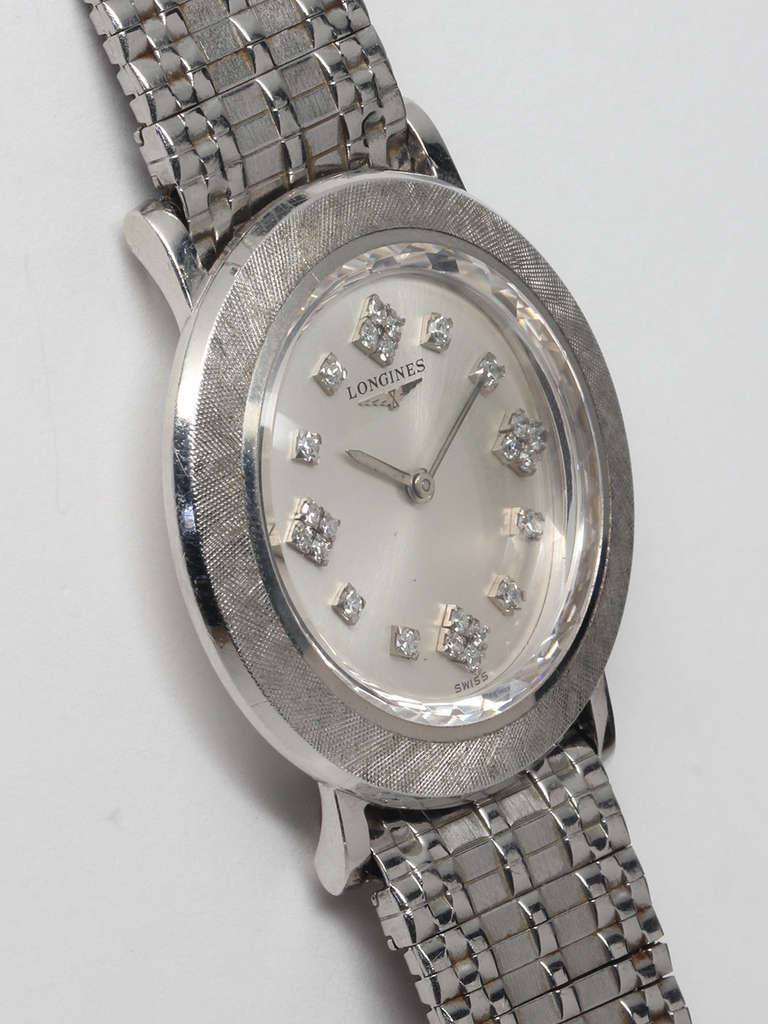 Longines 14k white gold Tuxedo wristwatch, circa 1960s. 32.75 X 37mm medium-size case with fine florentine finish. Beautiful original silvered satin dial with applied diamond indexes. 17-jewel manual-wind movement. Signed Longines logo crown. On
