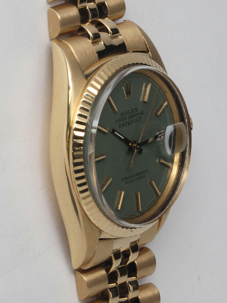 Rolex 18k yellow gold Datejust wristwatch, Ref. 1601, serial number 2.3 million, circa 1970. 36mm case with fluted bezel and acrylic crystal. Beautiful custom-colored sage green dial with applied indexes and baton hands. Powered by a self-winding