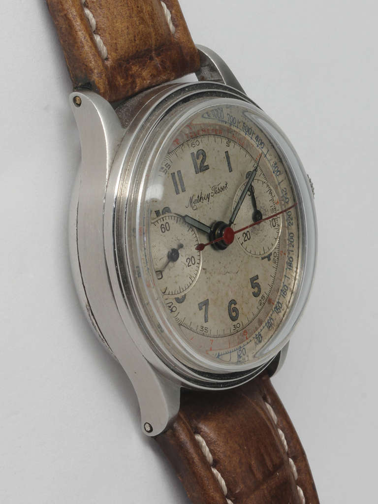 Matthey Tissot stainless steel chronograph wristwatch, circa 1940s. Medium size 33mm diameter heavy snap-back case. Featuring a very pleasing original two-tone silvered matte dial with luminous indexes and hands. Two-register manual-wind movement