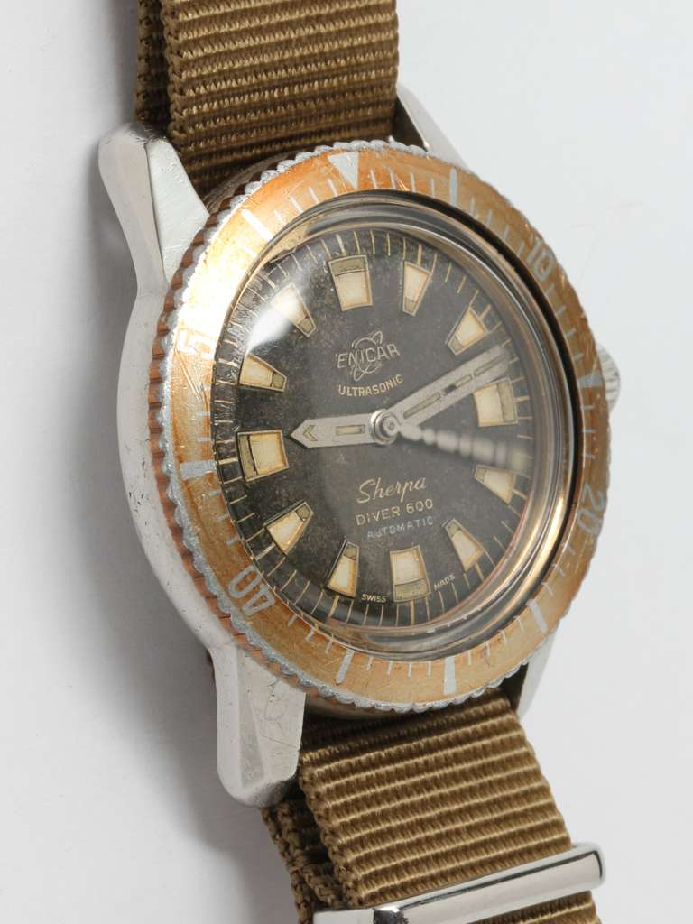 Enicar stainless steel Sherpa Diver 600 wristwatch, circa 1960s. 36. x 43mm screw-back engraved case with nicely aged bezel, signed Enicar crown. Patinaed original black dial with large raised indexes and matching wide hands with segmented seconds