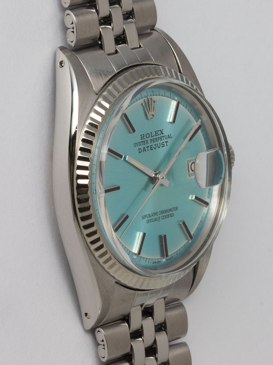 Rolex Stainless Steel Datejust Wristwatch ref 1601 serial #1.4 million circa 1966. 36mm diameter full size man's case with 14K white gold fluted bezel and acrylic crystal. With great looking custom colored Iceberg Blue pie pan dial with applied
