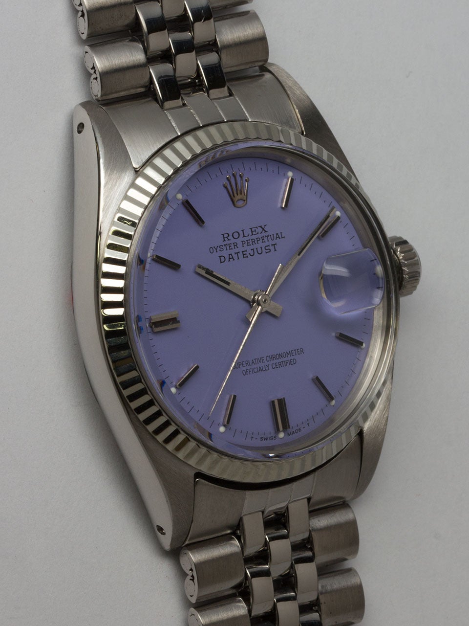 Rolex Stainless Steel Datejust Wristwatch ref 1601 serial #1.5 million circa 1967. 36mm diameter case with 14K white gold fluted bezel and acrylic crystal. Lovely custom colored Lilac dial with applied silver indexes and silver baton hands. Powered