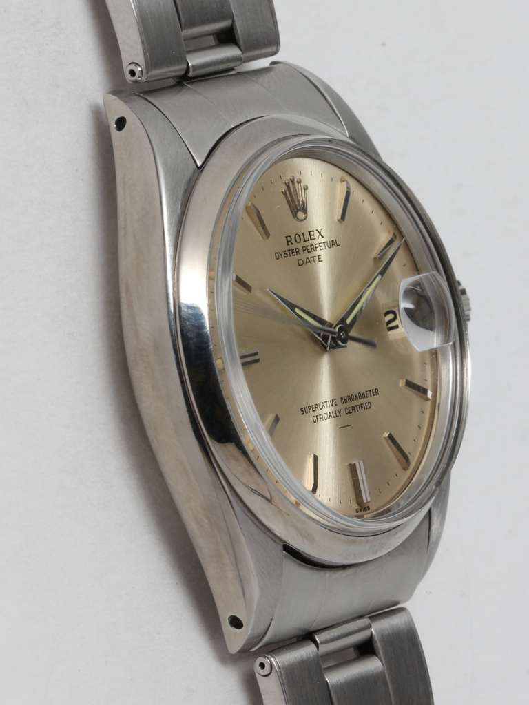 Rolex stainless steel Oyster Perpetual Date wristwatch, ref. 1500, serial no. 1.0 million, circa 1963.  34mm diameter case with smooth bezel and acrylic crystal. Original silvered satin dial with applied indexes and tapered dauphine hands.