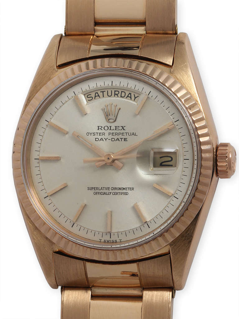 Rolex 18k rose gold Day-Date President wristwatch, Ref. 1803, serial number 1.7 million, circa 1968. 36mm case with fluted bezel, acrylic crystal. Silver satin dial with applied indexes. Self-winding calibre 1556 movement with sweep seconds and day