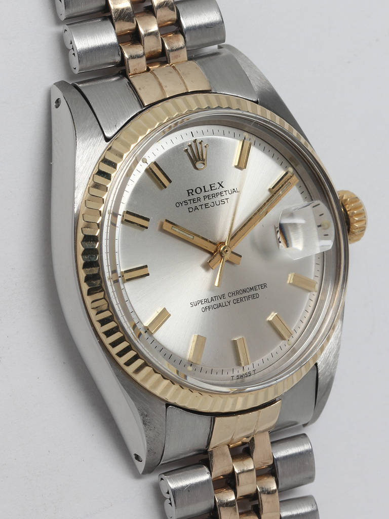 Rolex stainless steel and 14k yellow gold Datejust wristwatch, Ref 1601, serial number 2.6 million, circa 1970. 36mm case with 14k yellow gold fluted bezel and acrylic crystal. Original silvered satin 