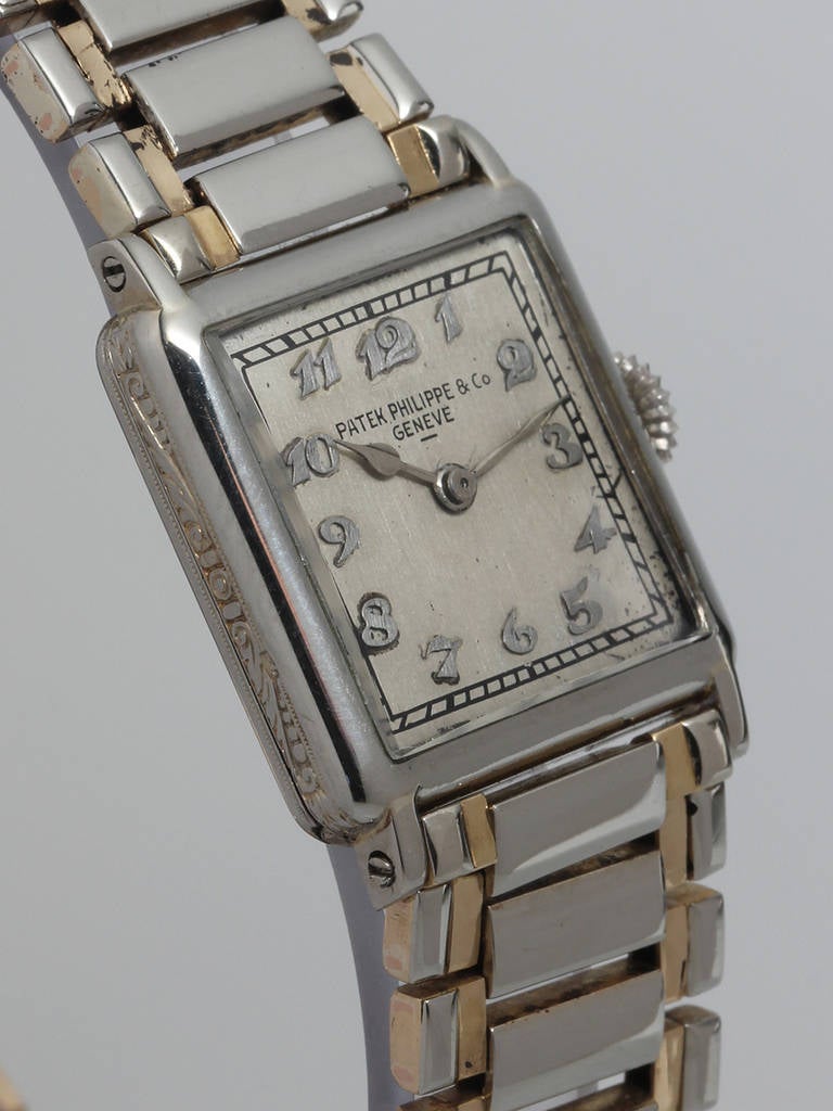 Patek Philippe 18k white gold small square wristwatch, circa 1930s. 21 x 26mm square hinged back case. Silvered dial with applied Breguet numerals and spade hands. 8'''-25 18-jewel manual-wind movement. Hinged case back, signed and numbered on