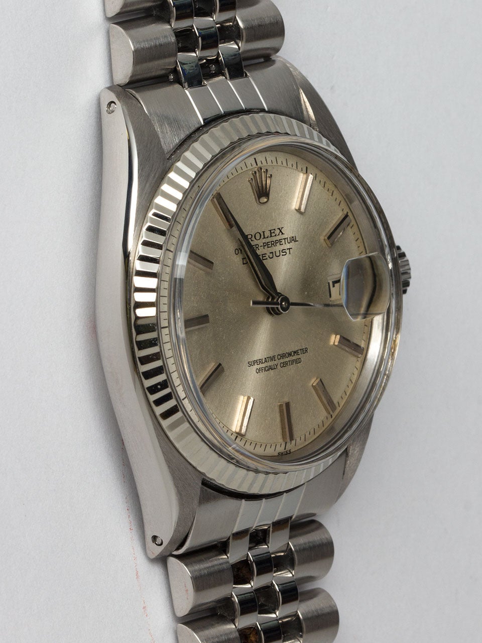 Rolex Stainless Steel Datejust ref 1601 circa 1970's. 36mm diameter full size man's model with 14K white gold fluted bezel and acrylic crystal. Original silvered satin pie pan dial with applied silver indexes and tapered silver hands. Powered by