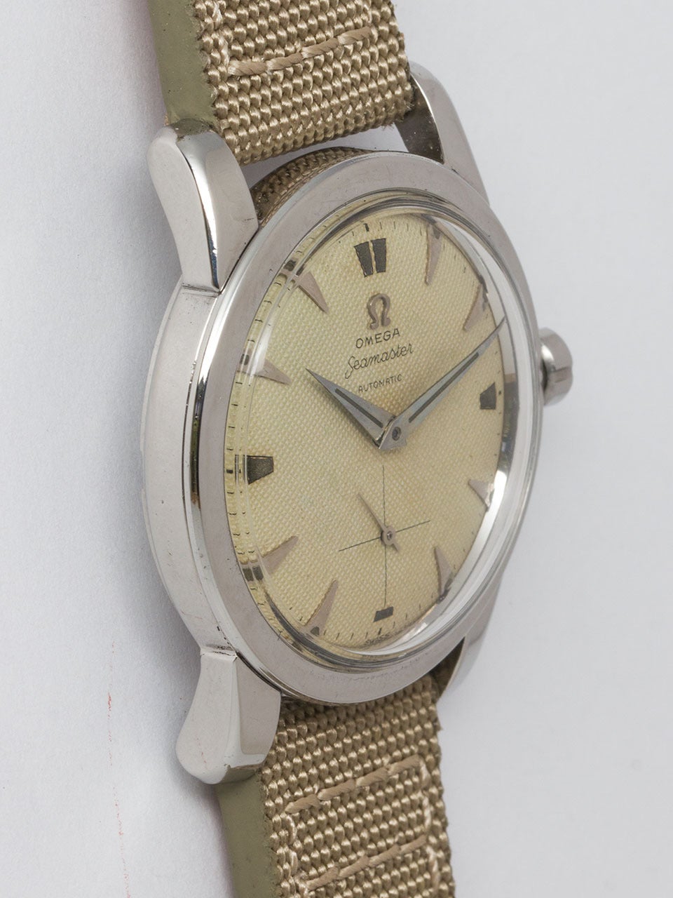 Omega Stainless Steel Seamaster ref C2576-4 movement serial #13.5 million circa 1952. Great looking example 34mm diameter case with wide bezel, wide lugs and acrylic crystal. Great looking original waffle dial with applied eccentric indexes and