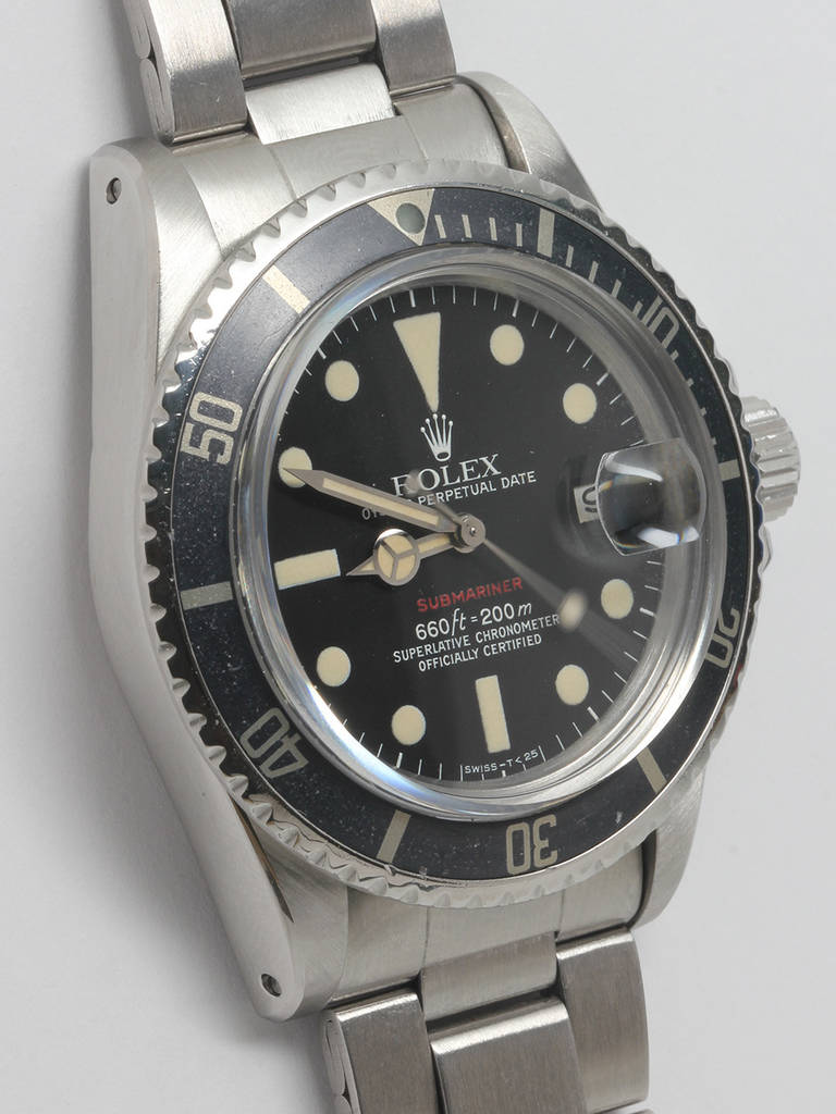 Rolex stainless steel Red Submariner wristwatch, Ref. 1680, serial number 3.7 million, circa 1973. 40mm case with nicely faded bezel insert and acrylic crystal. Magnificent example with deep black dial with rich patinaed luminous indexes and hands,