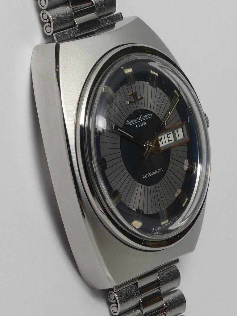 Jaeger-LeCoultre stainless steel Club Day-Date automatic wristwatch, circa 1960s. 37.5 x 43.5mm tonneau case with original JLC signed NSA bracelet. Very pleasing original two-tone navy blue and silvered dial with applied baton indexes. Self-winding