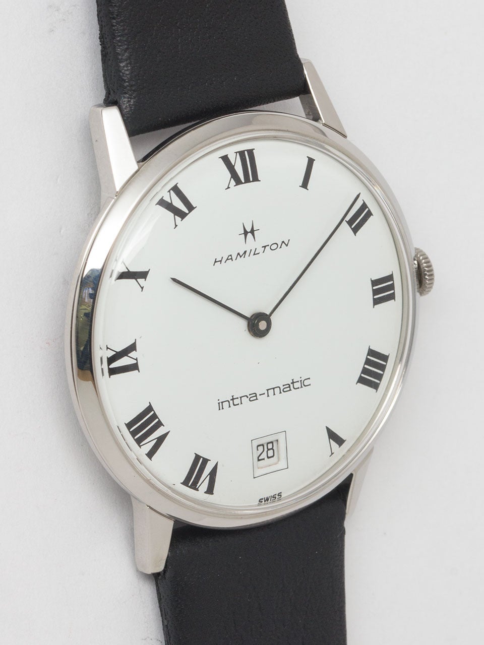 Hamilton Stainless Steel Intra-Matic circa 1970s. Featuring a 34.5mm x 39mm snap back case with white original white dial with bold black printed roman numerals and black baton hands. Powered by Hamilton Swiss automatic movement with date. With
