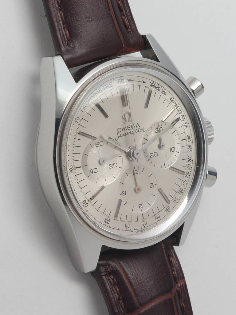 Omega stainless steel Seamaster chronograph wristwatch, Ref. 145.018, circa 1963. 35mm case with screw back, round chronograph pushers and signed Omega crown. Very mint condition matte silvered dial with applied indexes and Omega logo, three