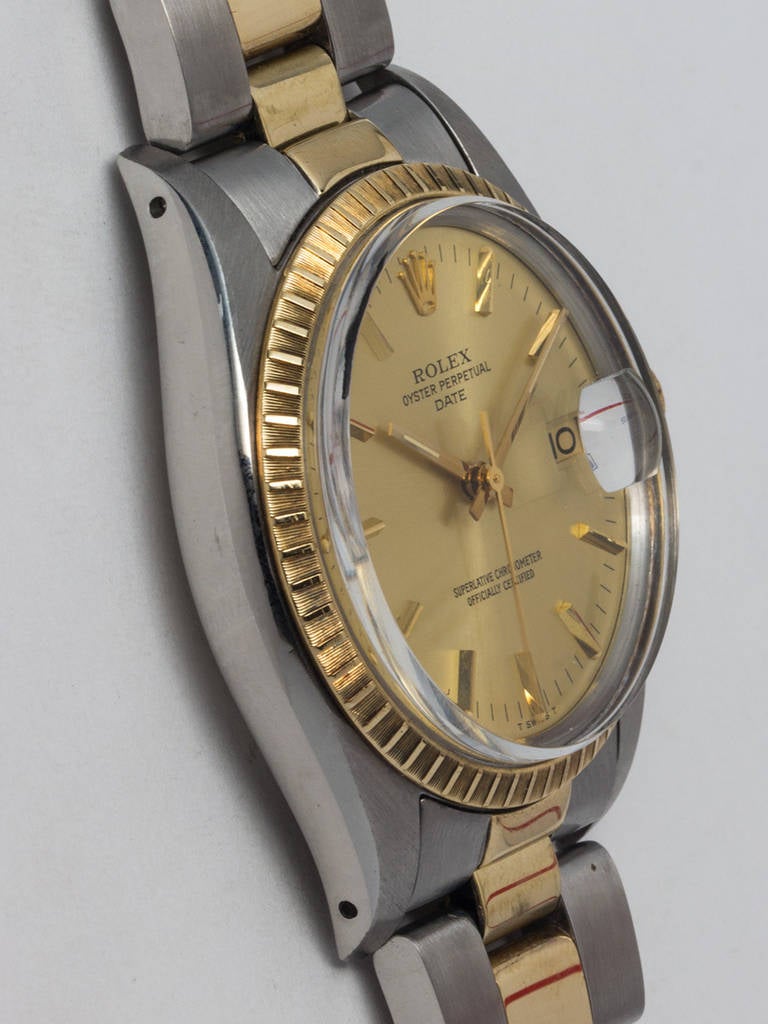 Rolex stainless steel and 14K yellow gold Oyster Perpetual Date wristwatch, Ref. 1505, serial number 5.4 million, circa 1978. 34 mm case with engine-turned bezel and acrylic crystal. Original champagne dial with applied gold indexes and gold baton