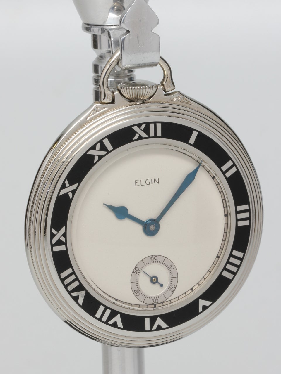 Elgin White Gold-Filled Art Deco Pocket Watch circa 1929. 12 size open face white gold-filled case with enamel chapter ring bezel. Matte white dial with heavy blued steel spade hands. 17-jewel manual-wind movement with subsidiary seconds. Clean case
