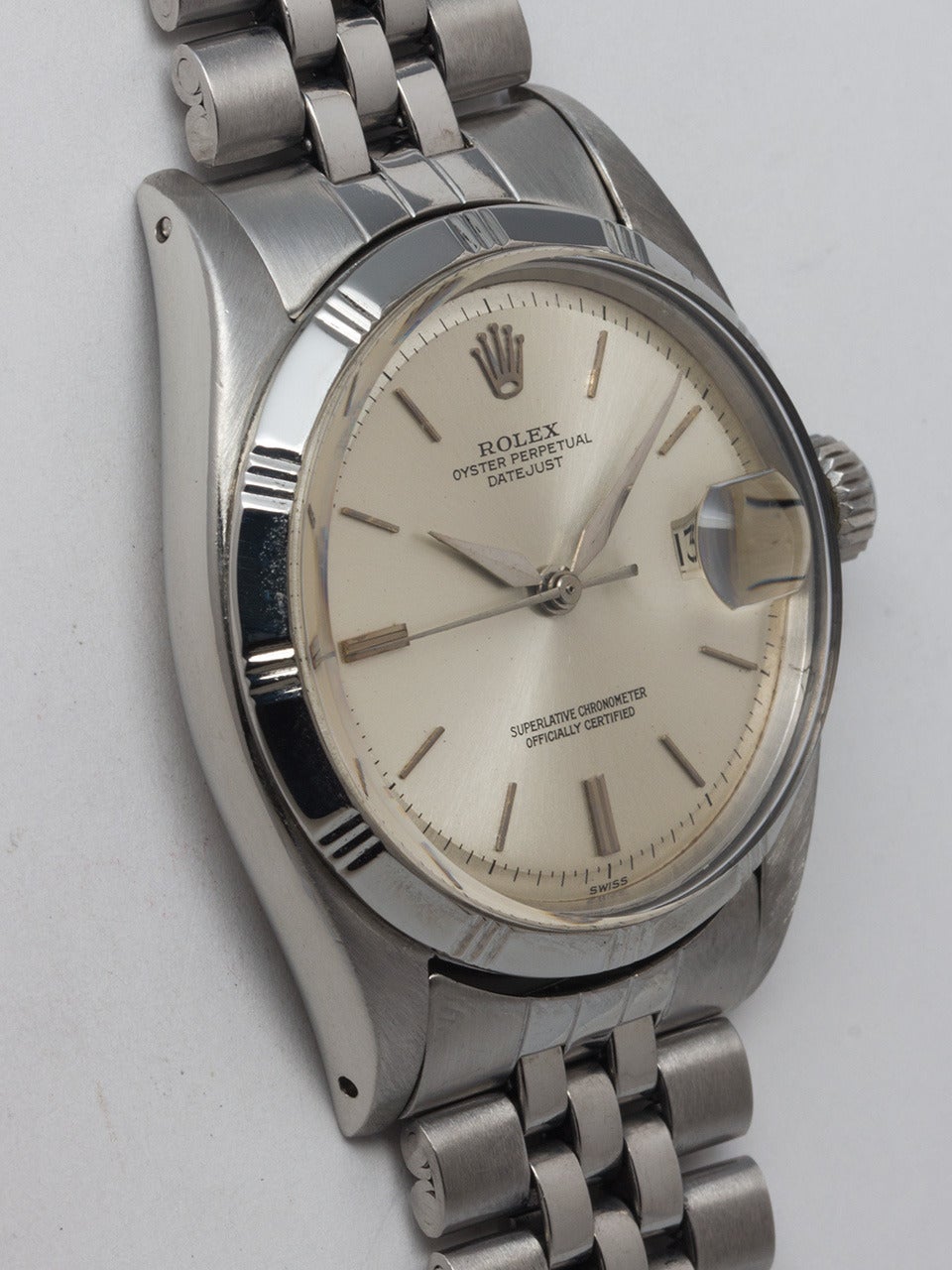 Rolex stainless steel Datejust wristwatch, Ref. 6305, circa 1959. 36mm full-size man's model with special bezel and acrylic crystal. Very pleasing original matte silvered dial with baton indexes and alpha hands. Powered by a self-winding movement