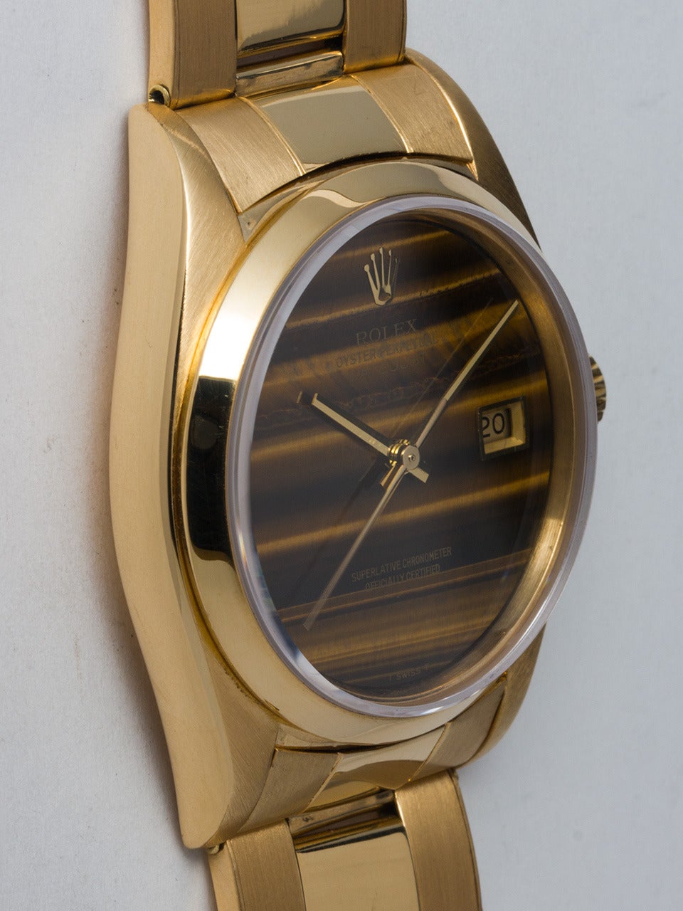 Rolex 18k yellow gold Datejust wristwatch, Ref. 16018, serial number 5.5 million, circa 1978. 36mm full-size man's model with smooth bezel and sapphire crystal without date magnifier. Beautiful original factory Tiger's Eye stone dial with gold hands
