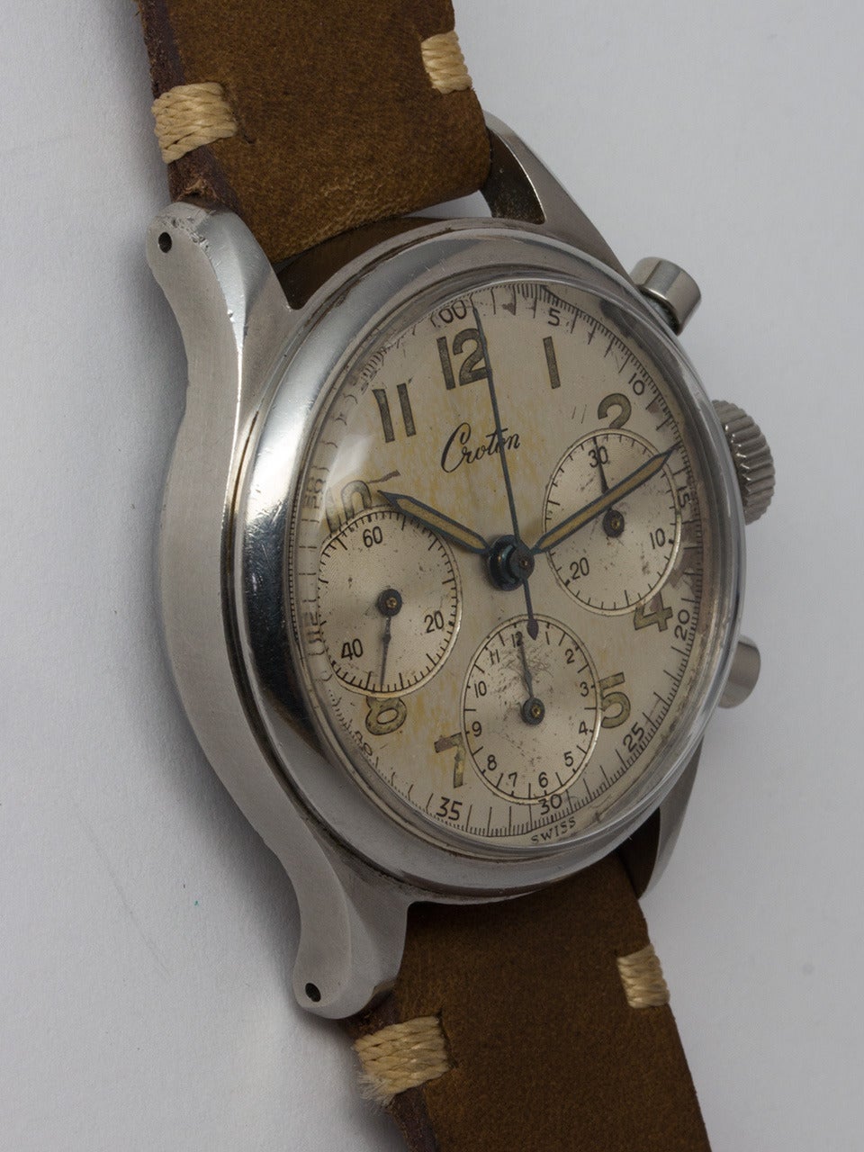 Croton Stainless Steel Chronograph Wristwatch, circa 1950s. 34mm case with screw back and round pushers. With a very pleasing original two-tone silvered satin dial with luminous dial and hands. Powered by a popular Valjoux 72 manual-wind movement