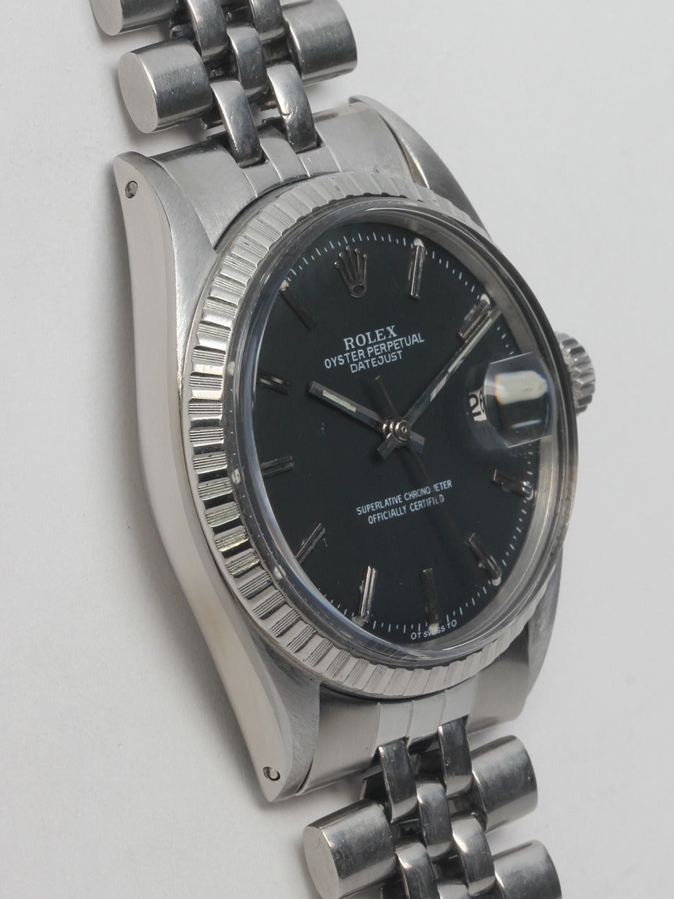 Rolex Stainless Steel Datejust Wristwatch, Ref. 1603, serial number 1.02 million, circa 1963. 36mm case with fluted bezel and acrylic crystal. Classic black pie pan dial with applied indexes and hands. Self-winding caliber 1570 movement with sweep