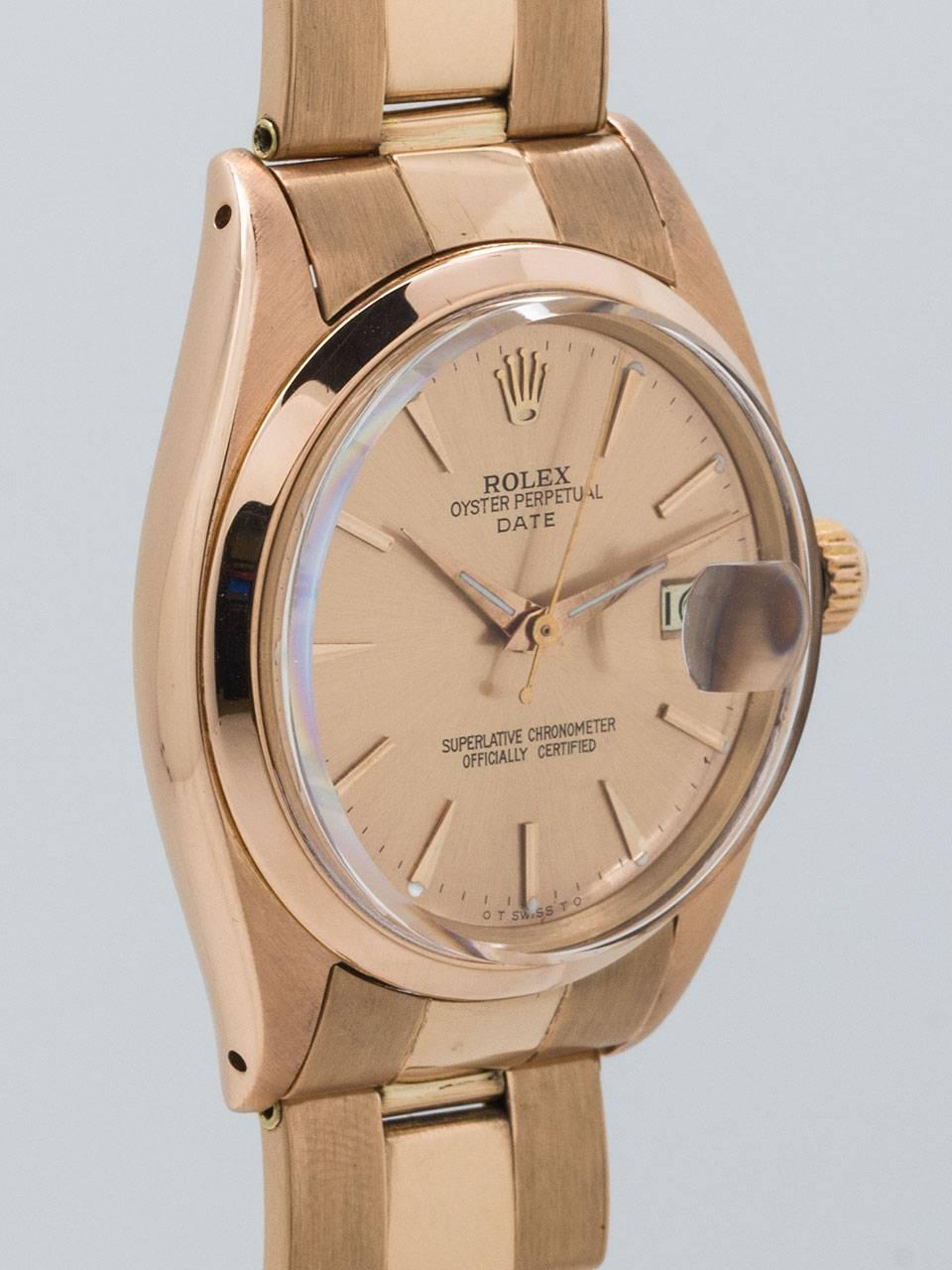 Rolex 18K Rose Gold Oyster Perpetual Date ref 1500 serial #715,xxx circa 1961. 34mm diameter man’s size model with smooth bezel and acrylic crystal. Beautifully restored rose dial with pink applied indexes and pink baton hands. Powered by self