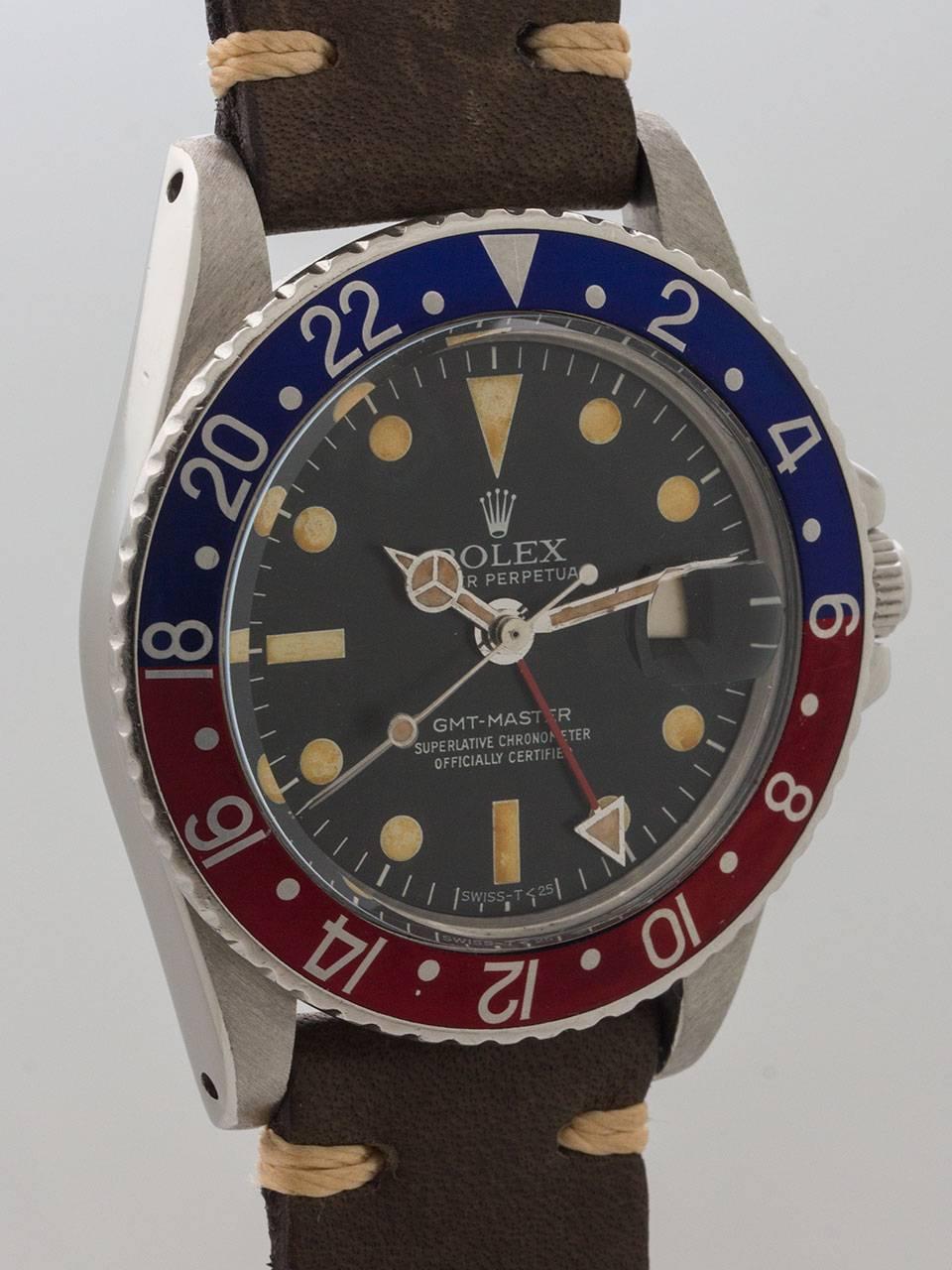 Rolex Stainless Steel GMT-Master ref 1675 serial no. 1.8 million circa 1967. Very pleasing vintage model with red and blue pepsi bezel and acrylic crystal. Nicely patina’d original matte black dial with patina’d luminous indexes and hands. Note some