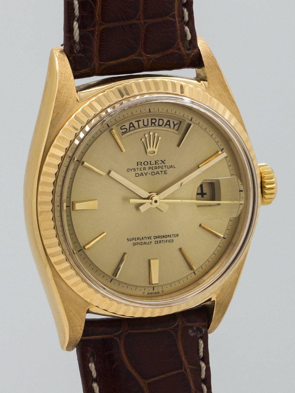 Rolex 18K Yellow Gold Day Date President ref 1803 serial #3.0 million circa 1972. 36mm diameter Oyster case with fluted bezel and acrylic crystal. Very pleasing original champagne pie pan dial with applied gold indexes and gold baton hands. Powered