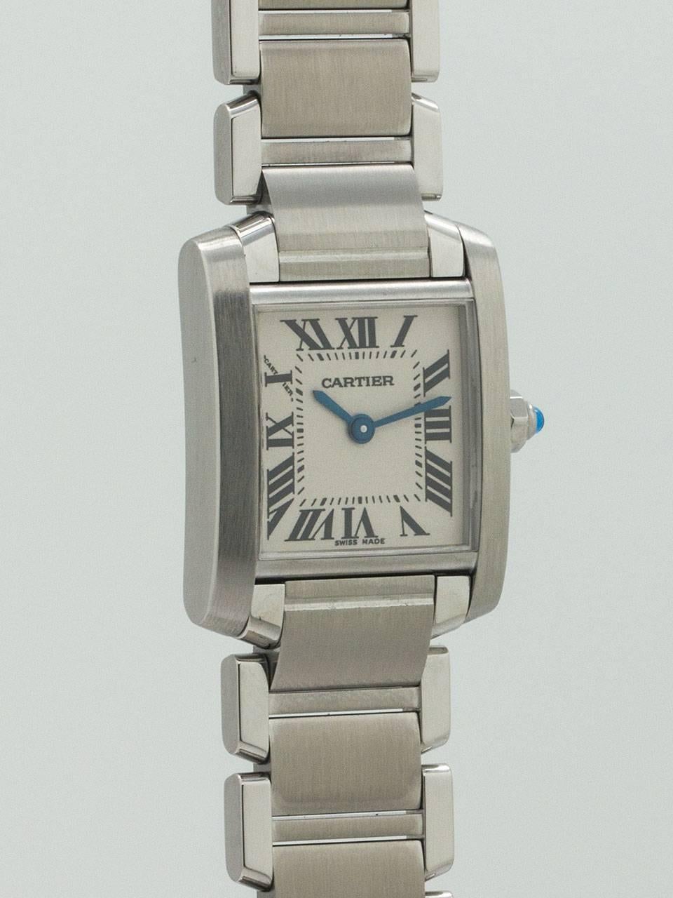 Cartier Stainless Steel Lady's Tank Francaise circa 2000s. Measuring 20 x 25mm with sapphire crystal and sapphire cabochon crown. Classic white dial with black Roman numerals and blue steel hands. Powered by quartz movement. On Cartier stainless