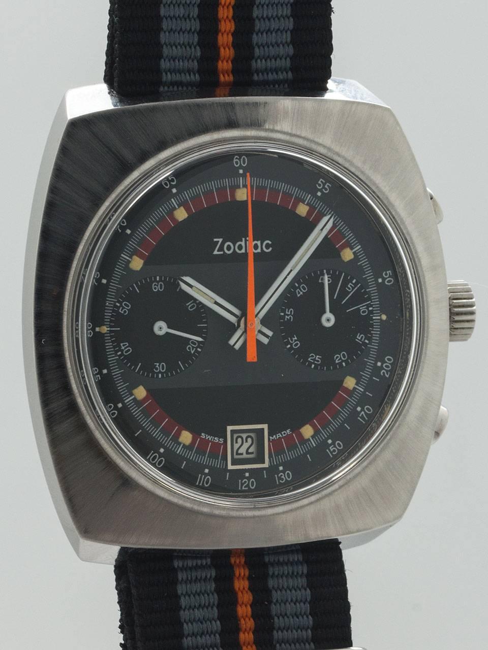 Zodiac Stainless Steel Chronograph Wristwatch circa 1970s. Robust 40 x 44mm cushion shaped stainless steel ref no. 842.888 signed Zodiac case. With beautiful condition original gray, black, and orange detail dial with applied silver indexes and