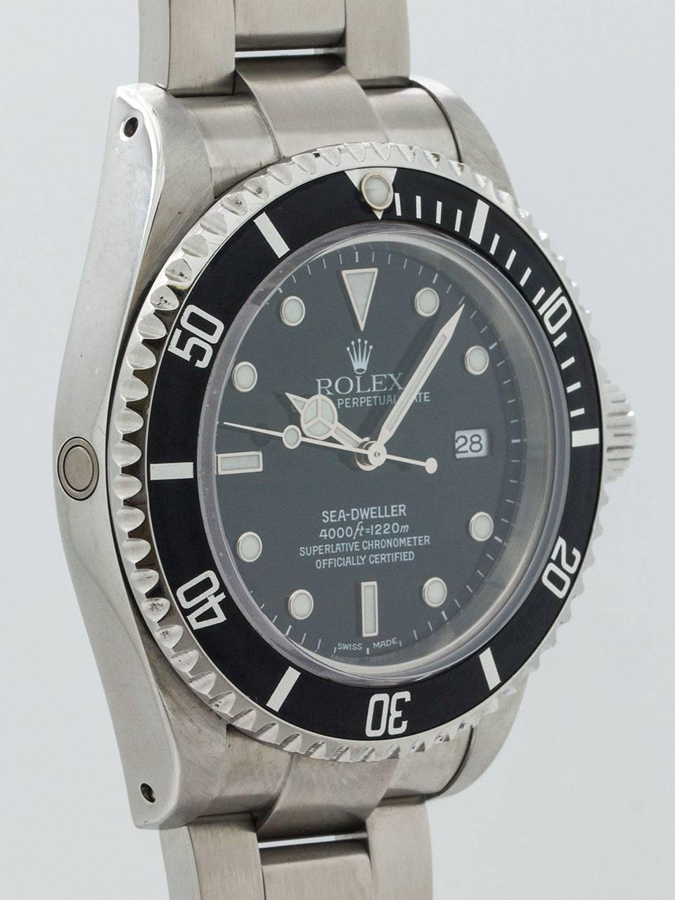 Rolex Stainless Steel Sea-Dweller ref 16600 serial# Y6 circa 2002. Full set complete with box and papers and all original accessories. Featuring 40mm diameter case with unidirectional elapsed time bezel and sapphire crystal. Original glossy black