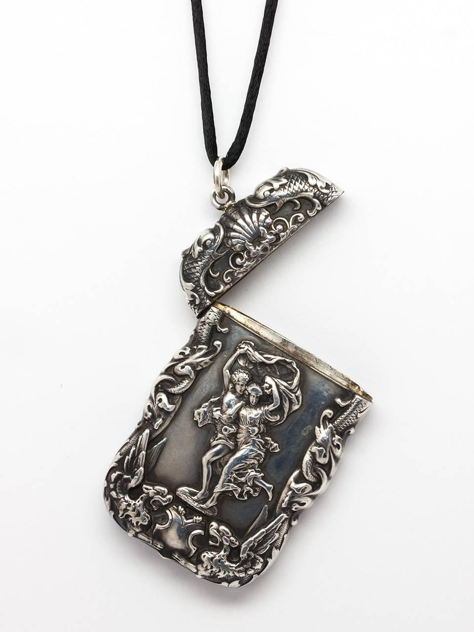 Fantastic, sterling silver Art Nouveau match safe pendant. In a highly intricate repousse design of God and Goddess, griffins, shells and sea serpents. Gorgeous hand engraved monogram on opposite side G E W. This beautifully executed antique match