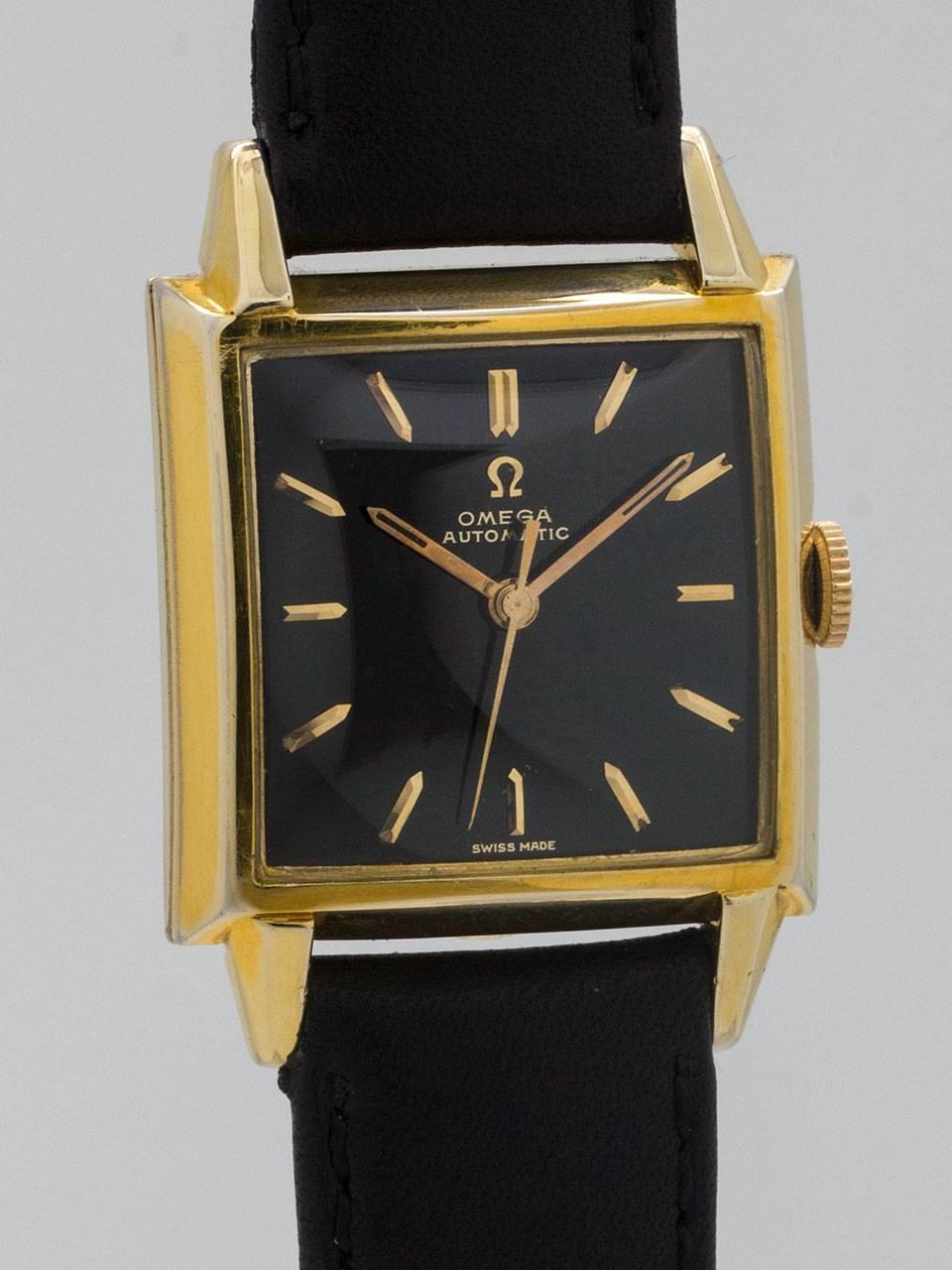 Omega Yellow Gold Filled Automatic Dress Wristwatch ref 6253 circa 1956.  with original gloss black gilt dial. Featuring 28 x 39mm square case with extended lugs and glass crystal. Original gloss black gilt dial with raised gold indexes and gilt